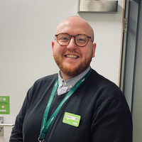 Headshot of Adrian Rymer-Sanderson.