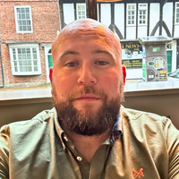 Headshot of Bill McLoughlin.