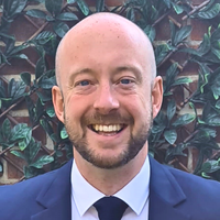 Headshot of Chris Curtis.