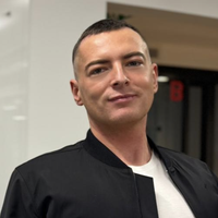 Headshot of Angelo McCaw.