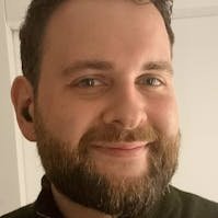 Headshot of Joshua Garrity.