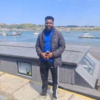 Headshot of Sunday Idika.