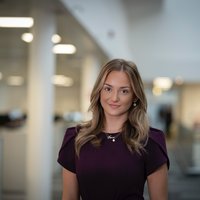 headshot of Kiara Orchard.