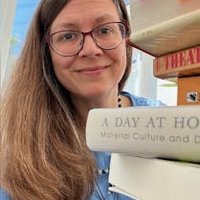 Headshot of Lizzie Hughes.