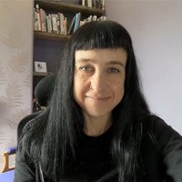 Headshot of Emma Clayton.